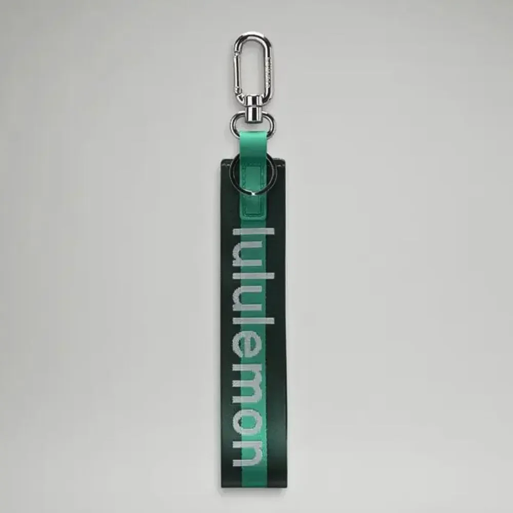 NEW Lululemon Never lost Keychain Wordmark Legacy Green/Cascadia Green/Silver